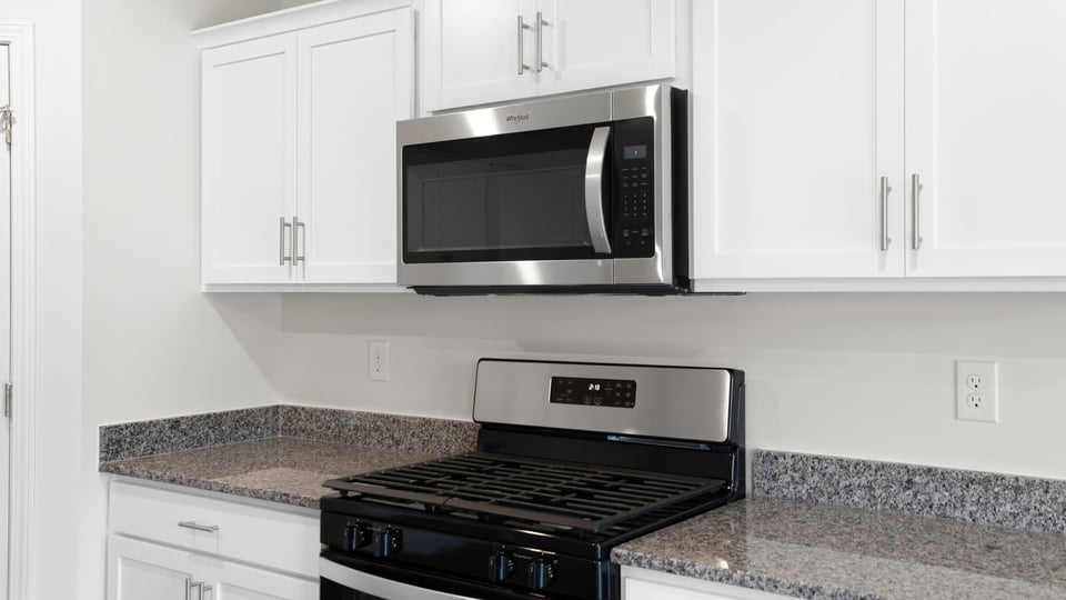 Kitchen with stainless steel appliances.
