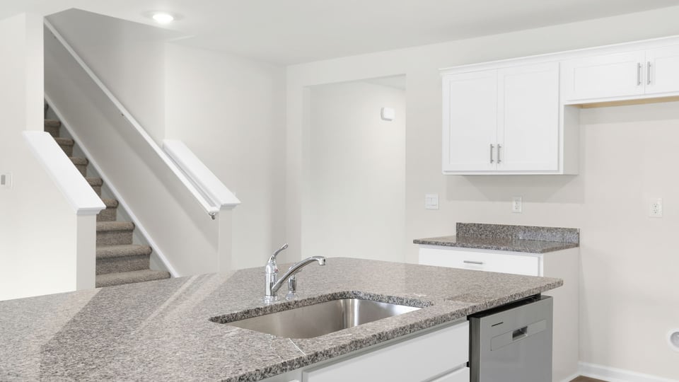 Kitchen with stainless steel appliances.