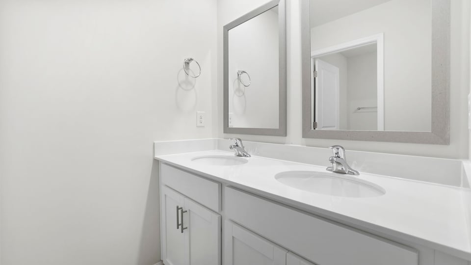 Bathroom with double vanity sink.