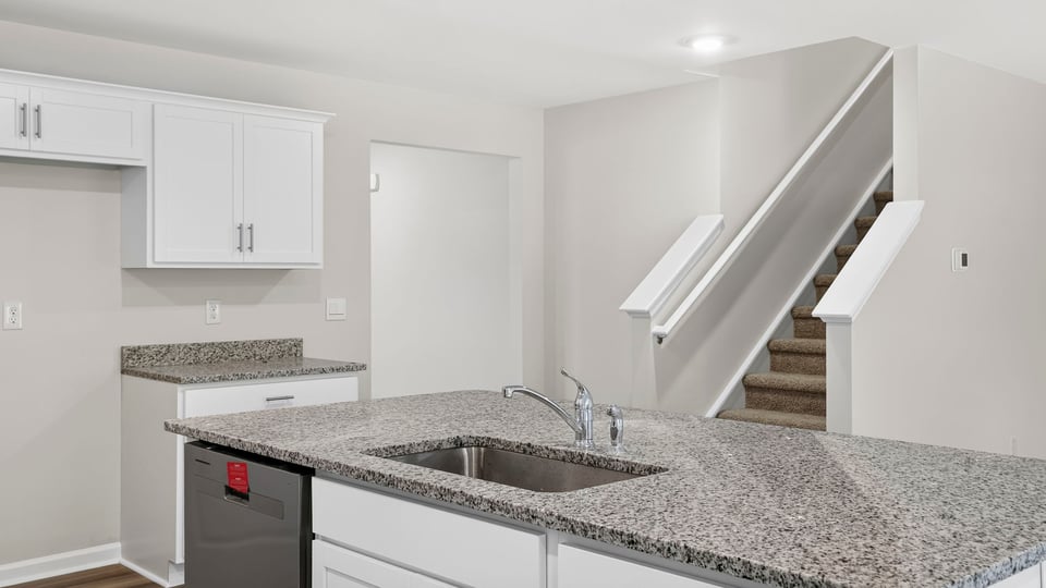 Kitchen with stainless steel appliances.