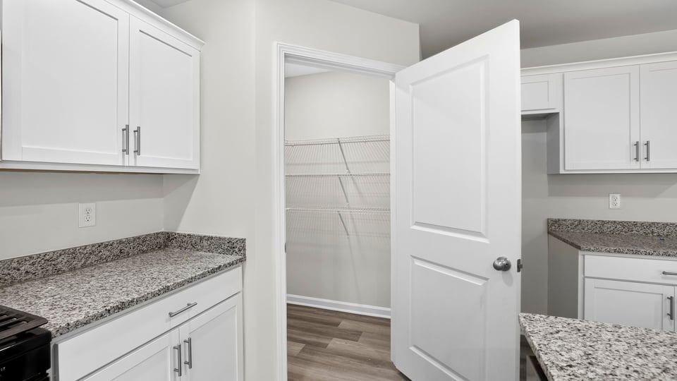 Kitchen with stainless steel appliances.