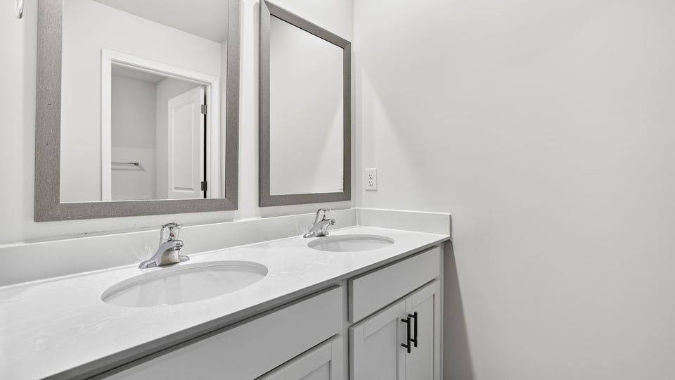 Bathroom with double vanity sink.