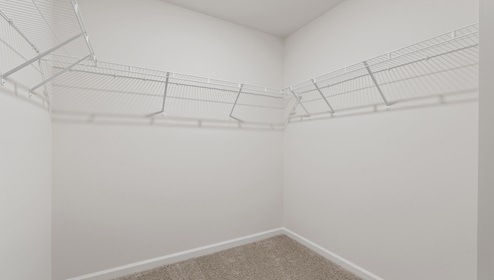 Closet with hanging storage rack.
