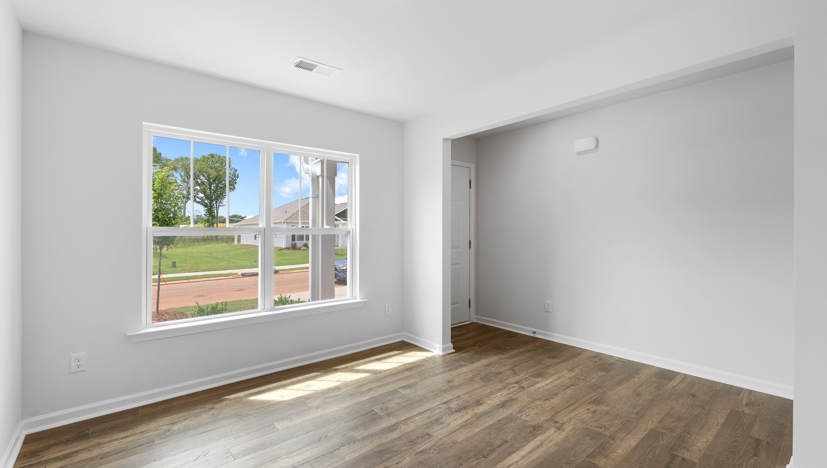 Family room with windows.