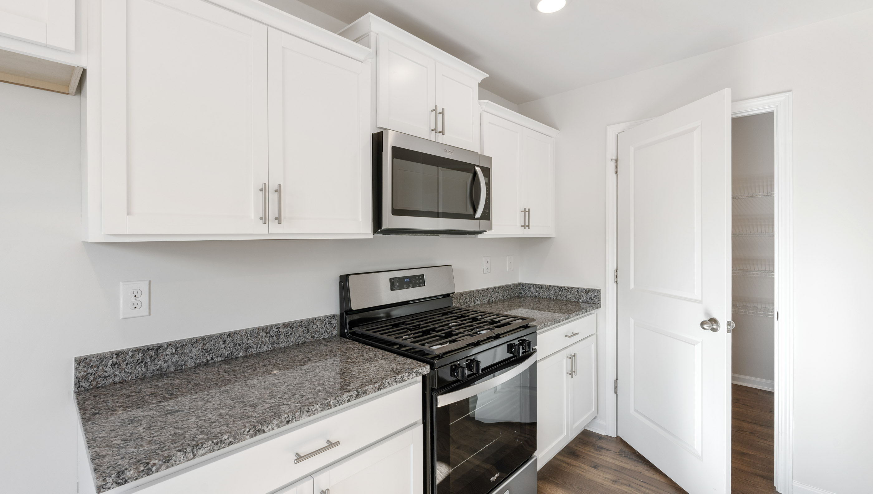 Kitchen with stainless steel appliances.