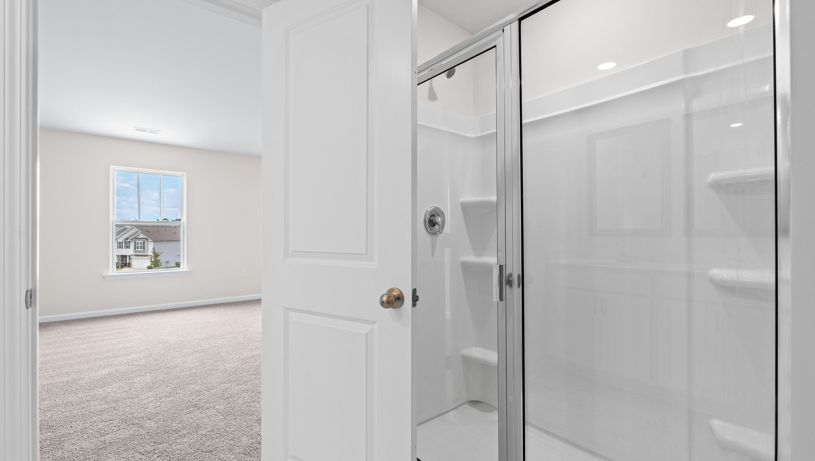 Bathroom with walk in shower.