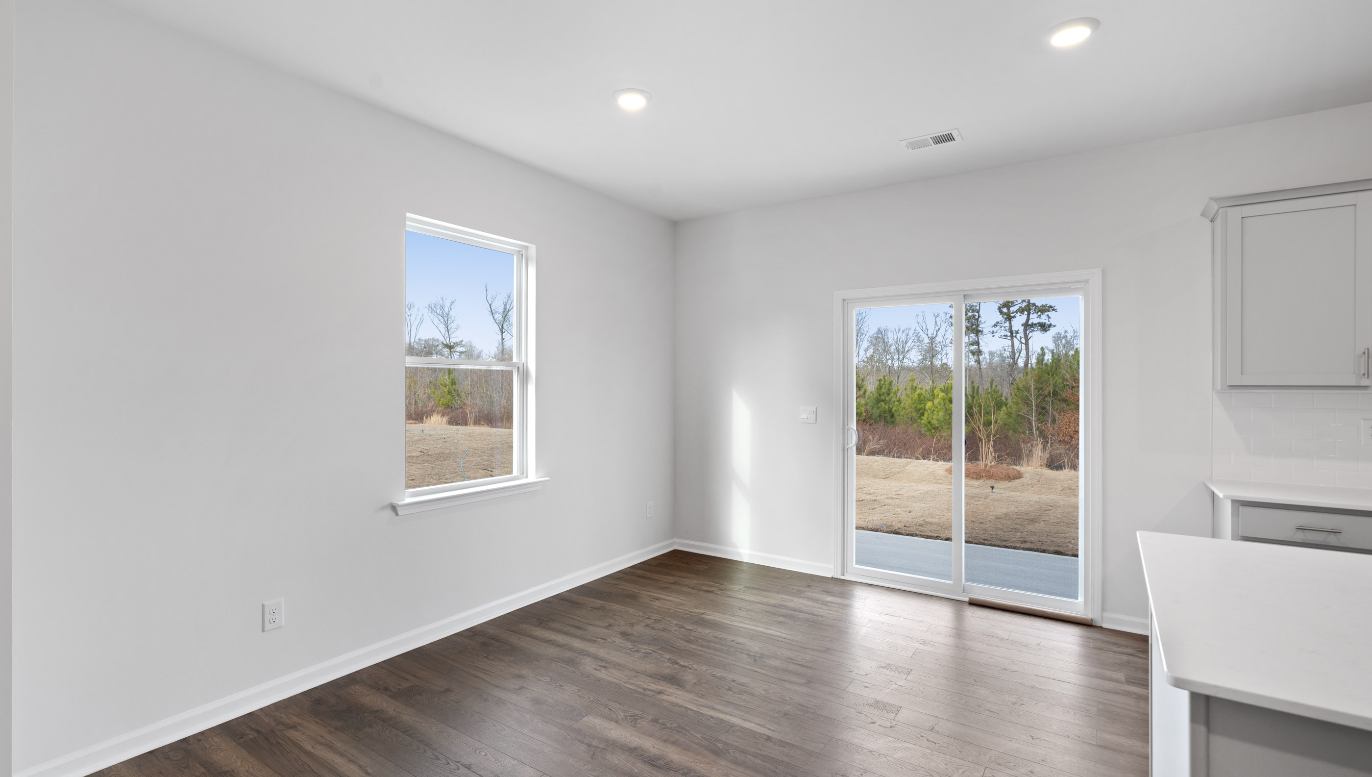 Family room with windows.
