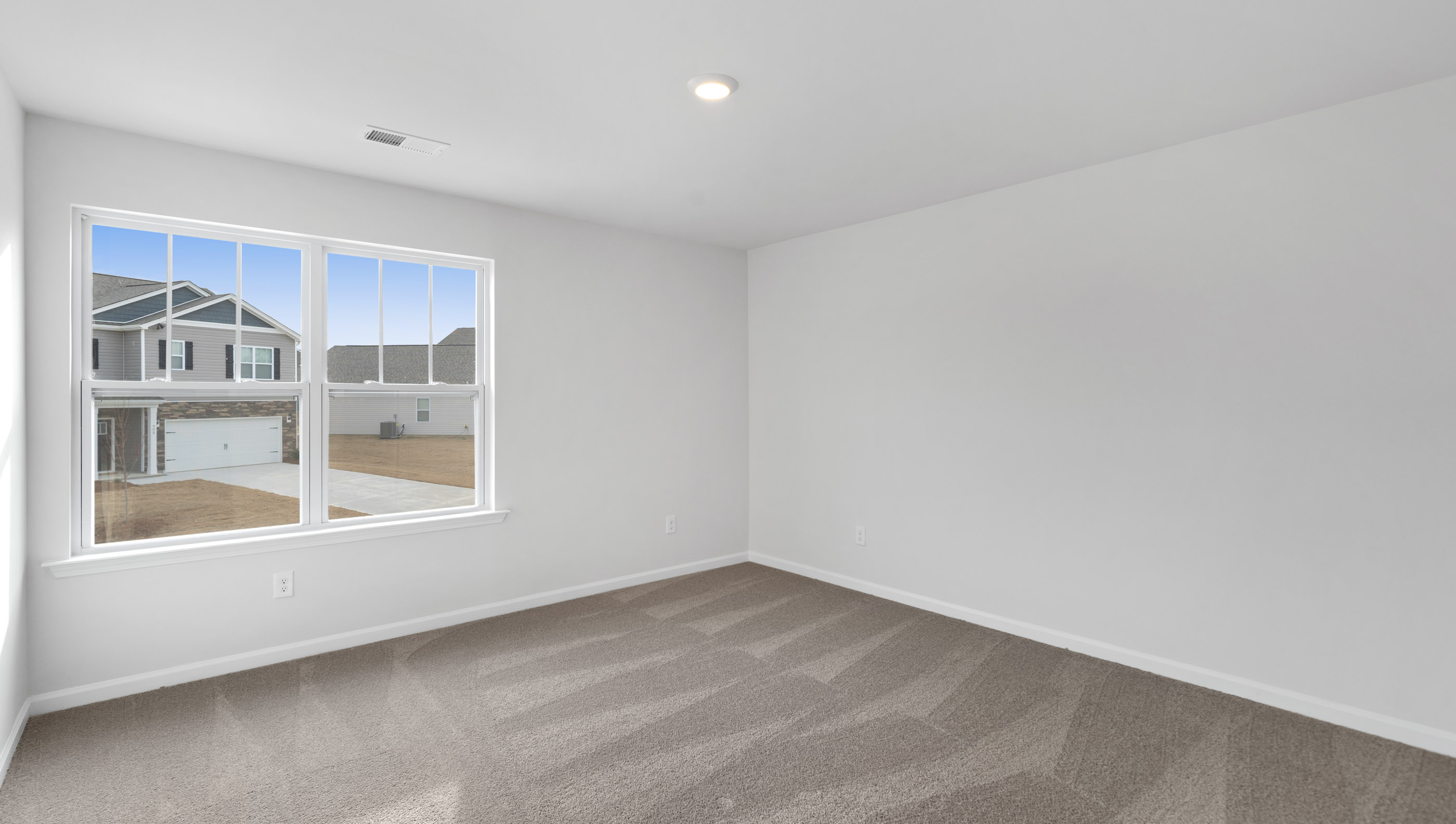 Family room with windows.