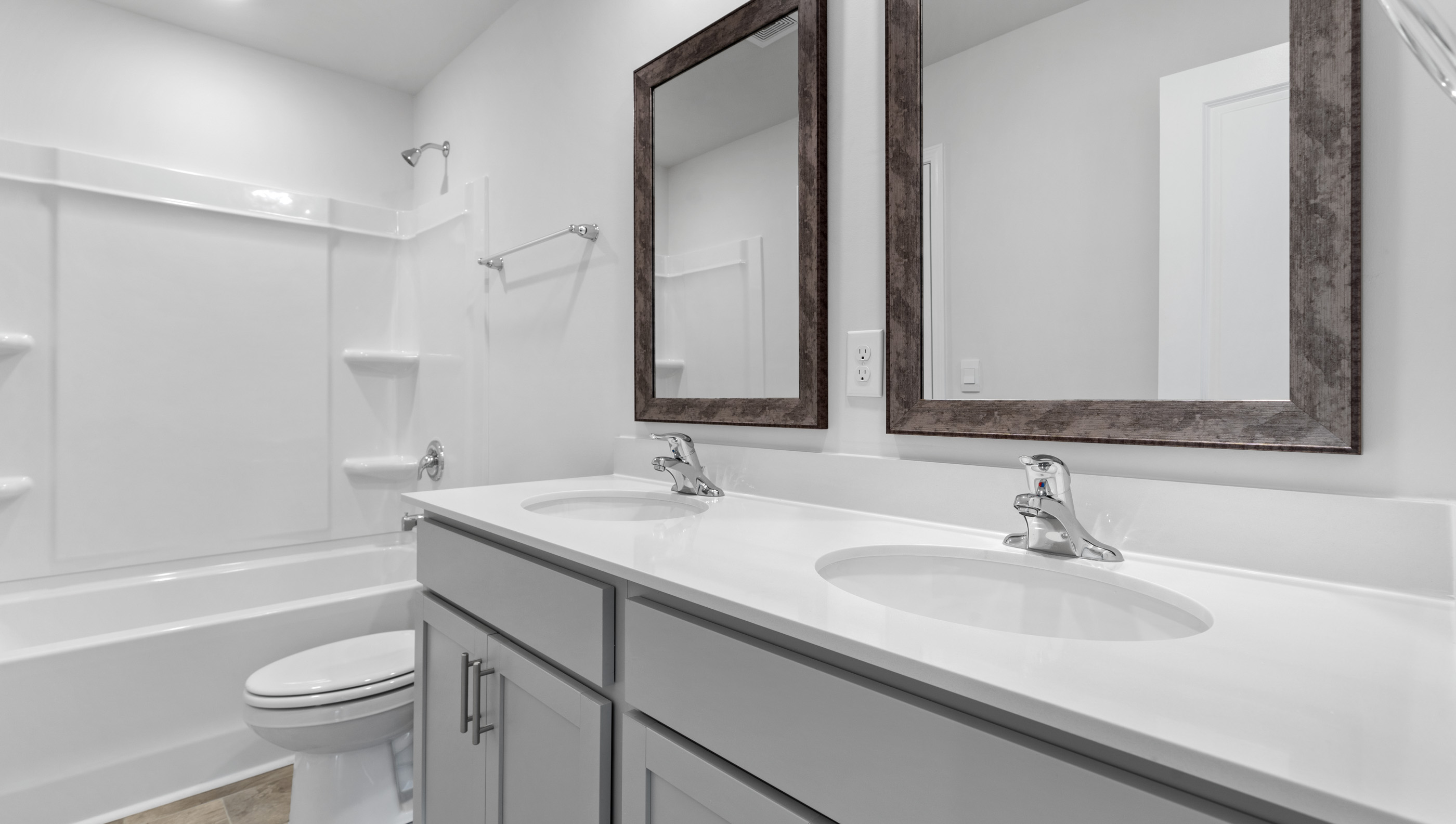 Bathroom with double vanity sink.