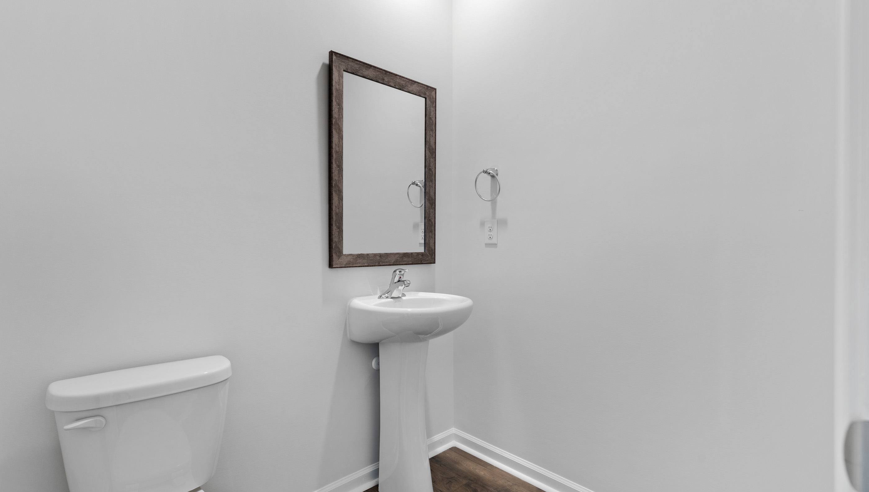 Bathroom with toilet and sink.