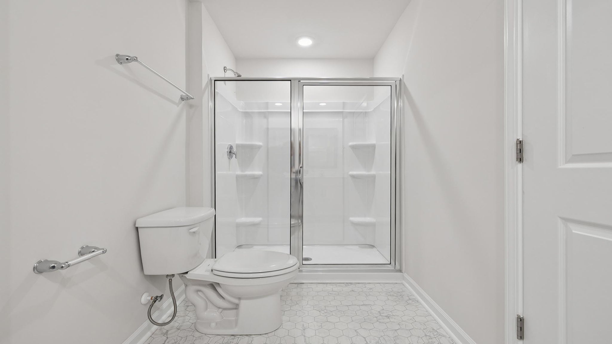 Primary bathroom with double vanity sinks.