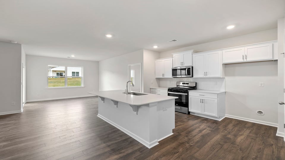 View of the kitchen and dining area.