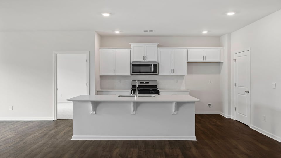 Kitchen has recessed lighting.