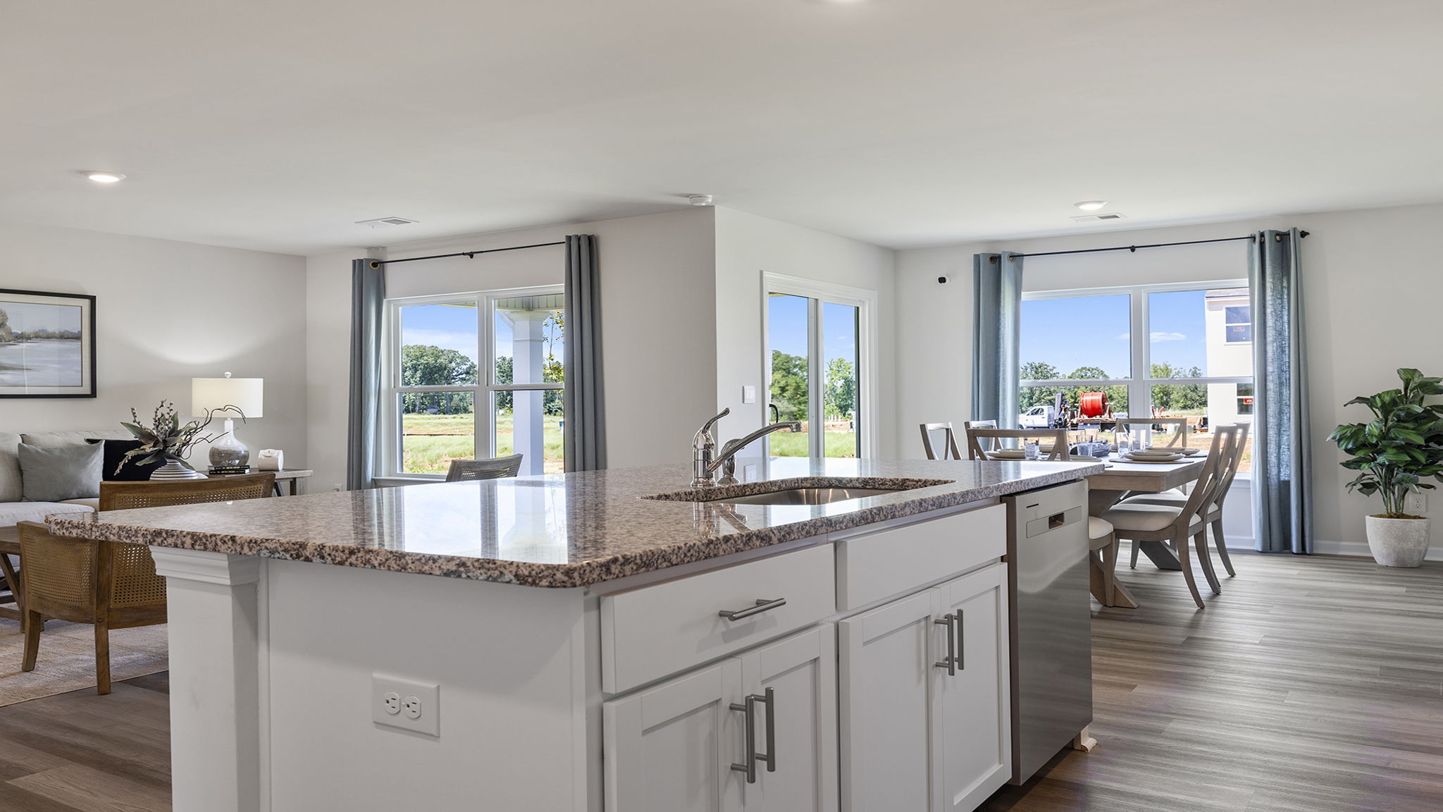 Kitchen with island and cabinets.