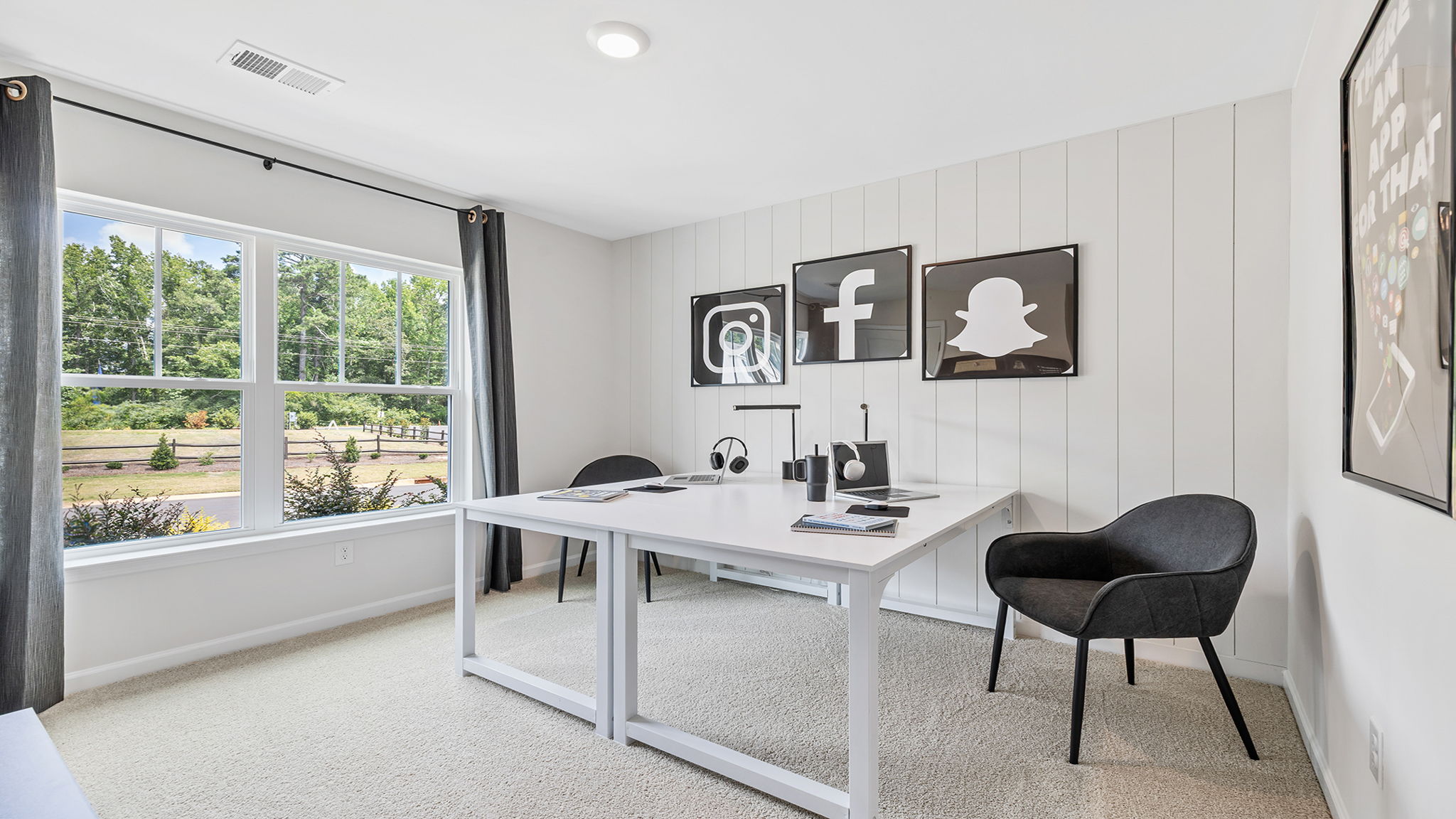 Bedroom with carpet and window.