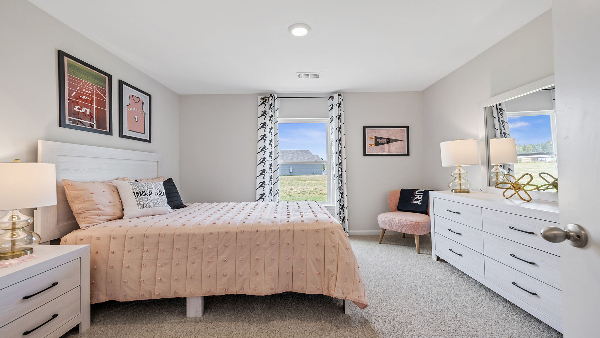 Bedroom with carpet and window.
