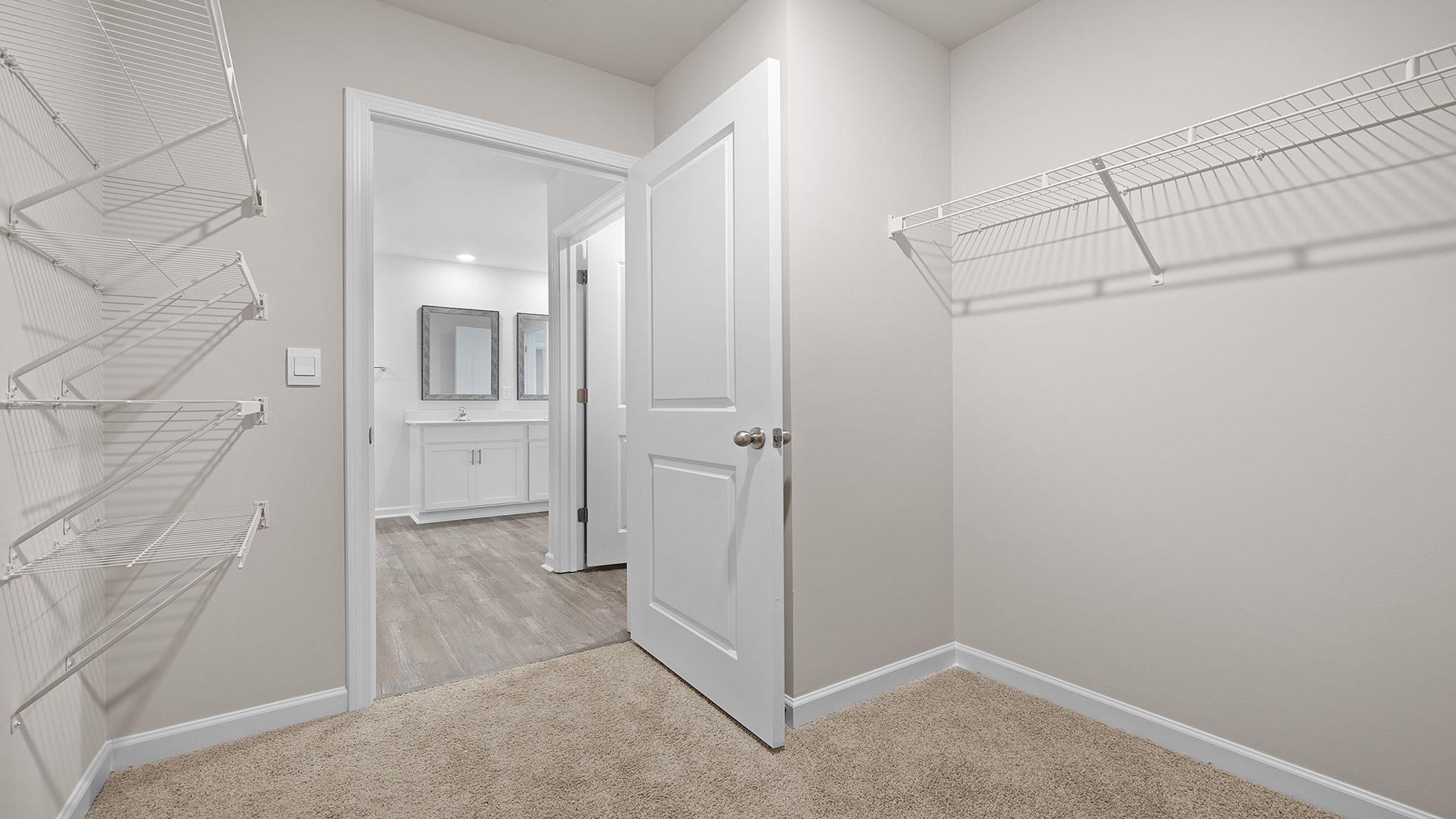 Primary walk in closet.