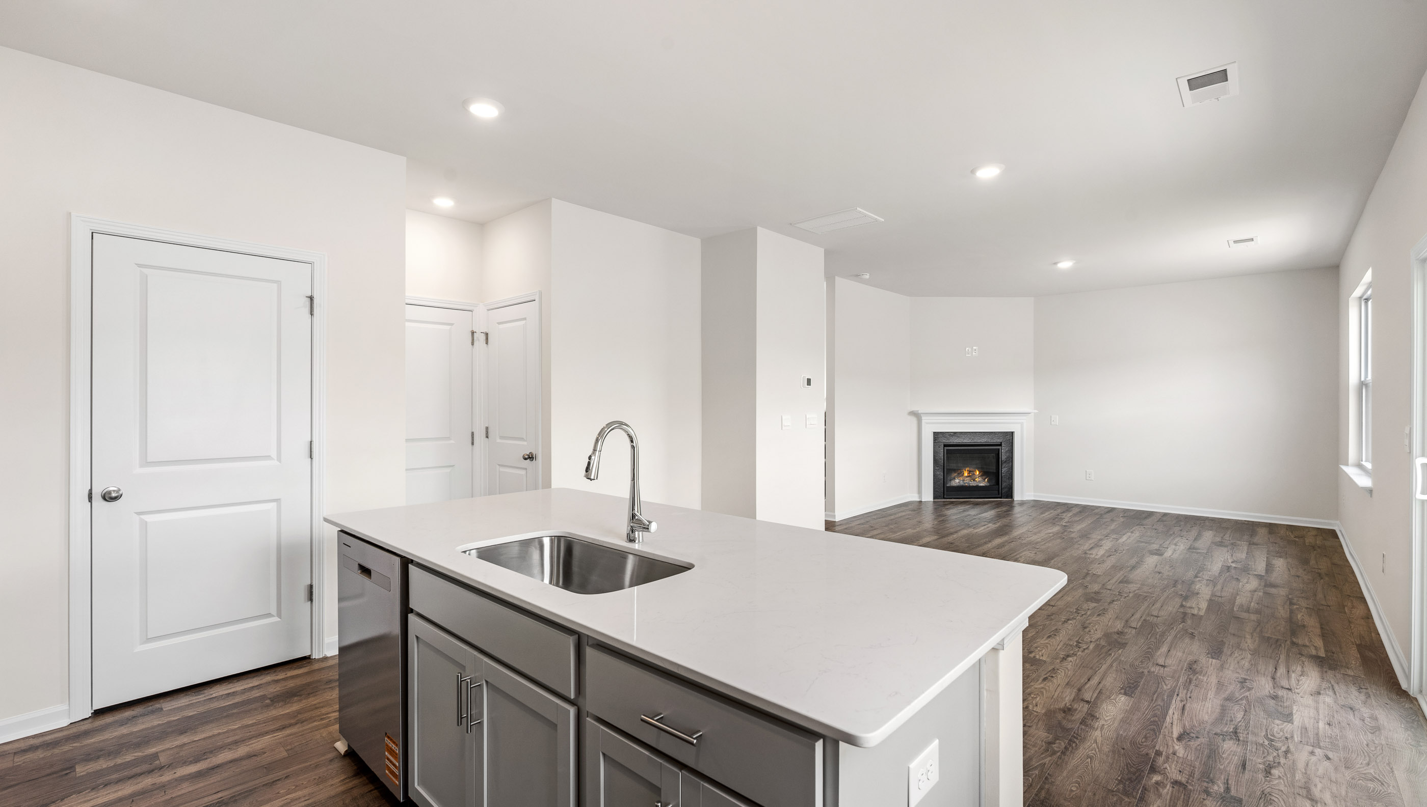 View of great room open to the kitchen.