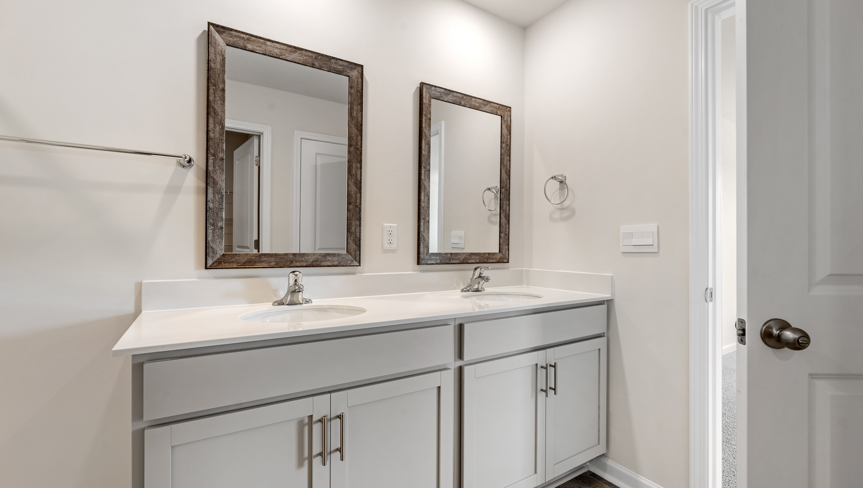 Dual sink vanity and mirrors.