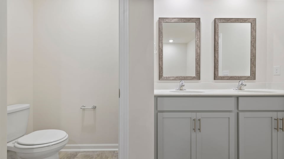 Bathroom with double vnaity sink.