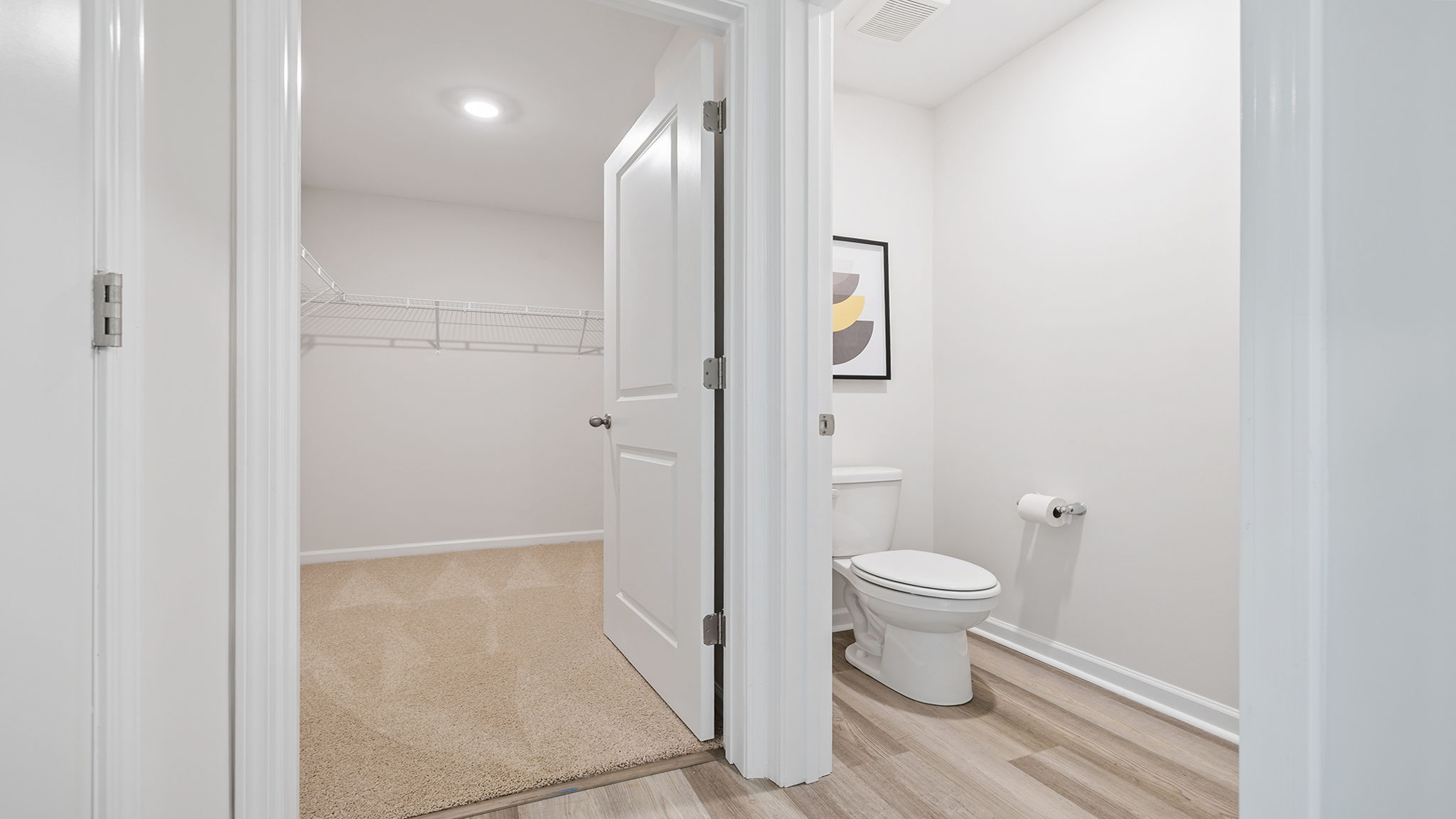 Primary bathroom with double vanity sinks.
