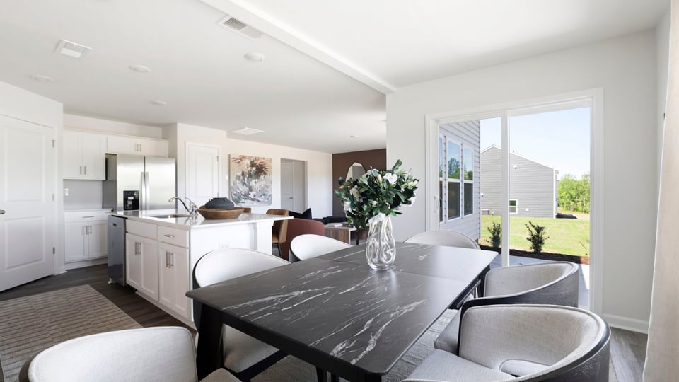 Dining area with view of family room.