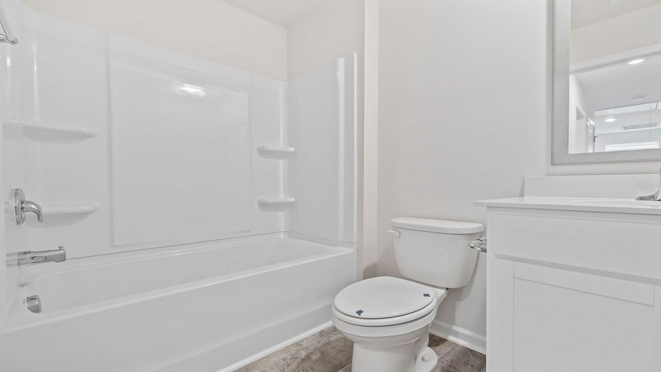 Bathroom with vanity and tub.