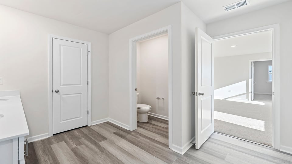 Bathroom with vanity and tub.