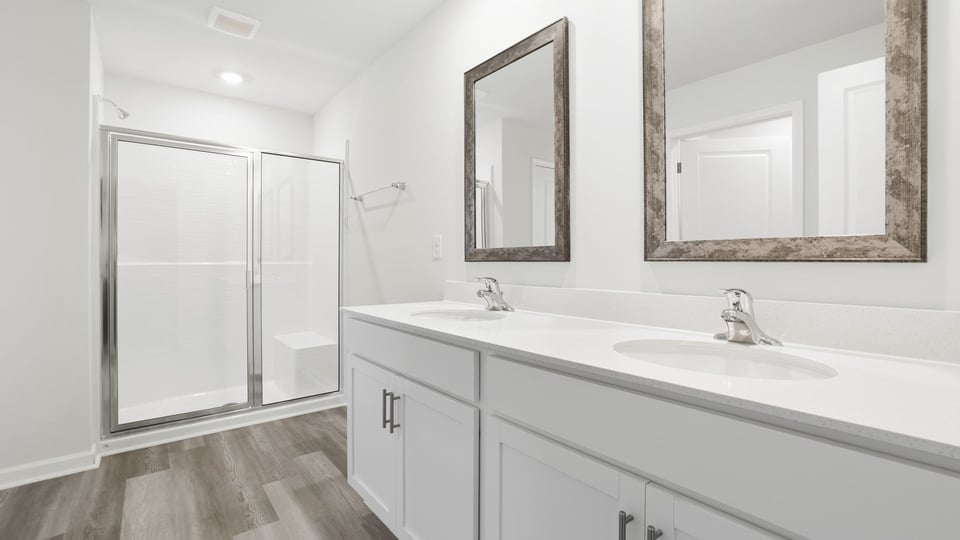Bathroom with walk in shower.