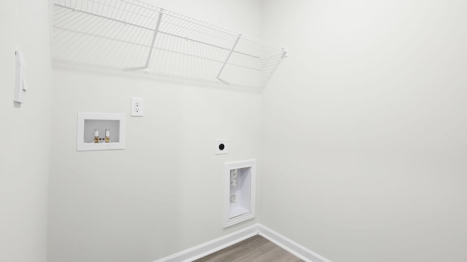 Walk in laundry room.