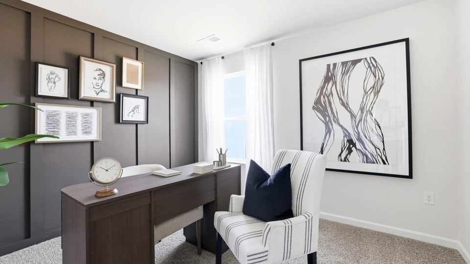 Bedroom with carpet and window.
