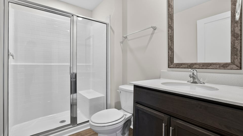 Bathroom with walk in shower.