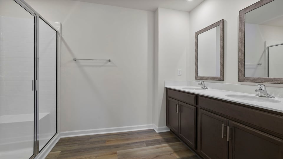 Bathroom with walk in shower.