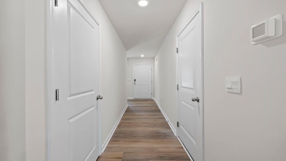 View of hallway to entrance.