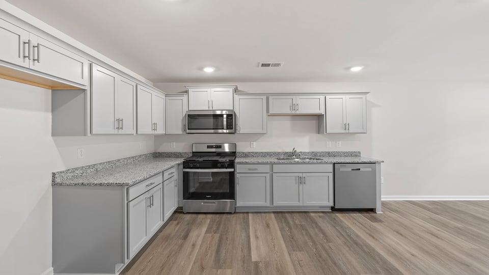Kitchen with stainless steel appliances.