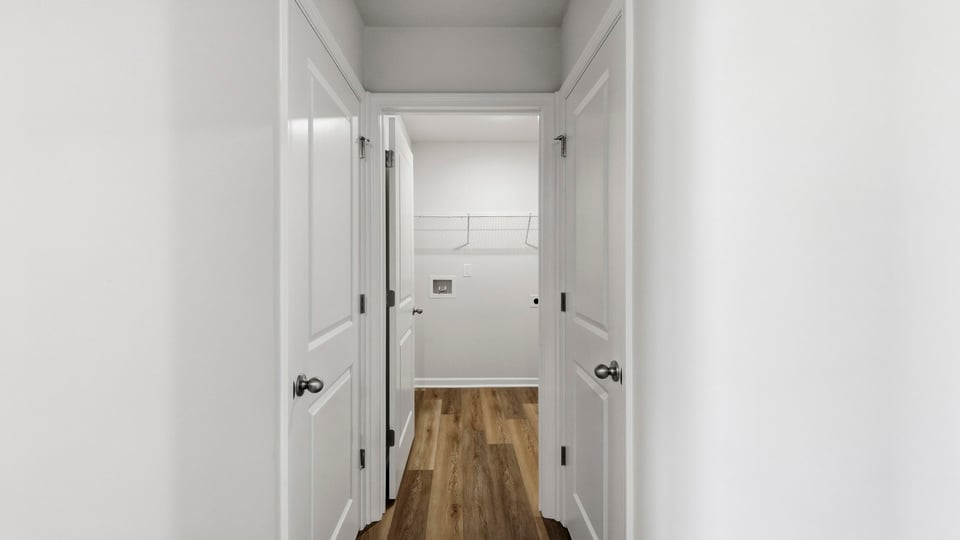 Primary closet with window.
