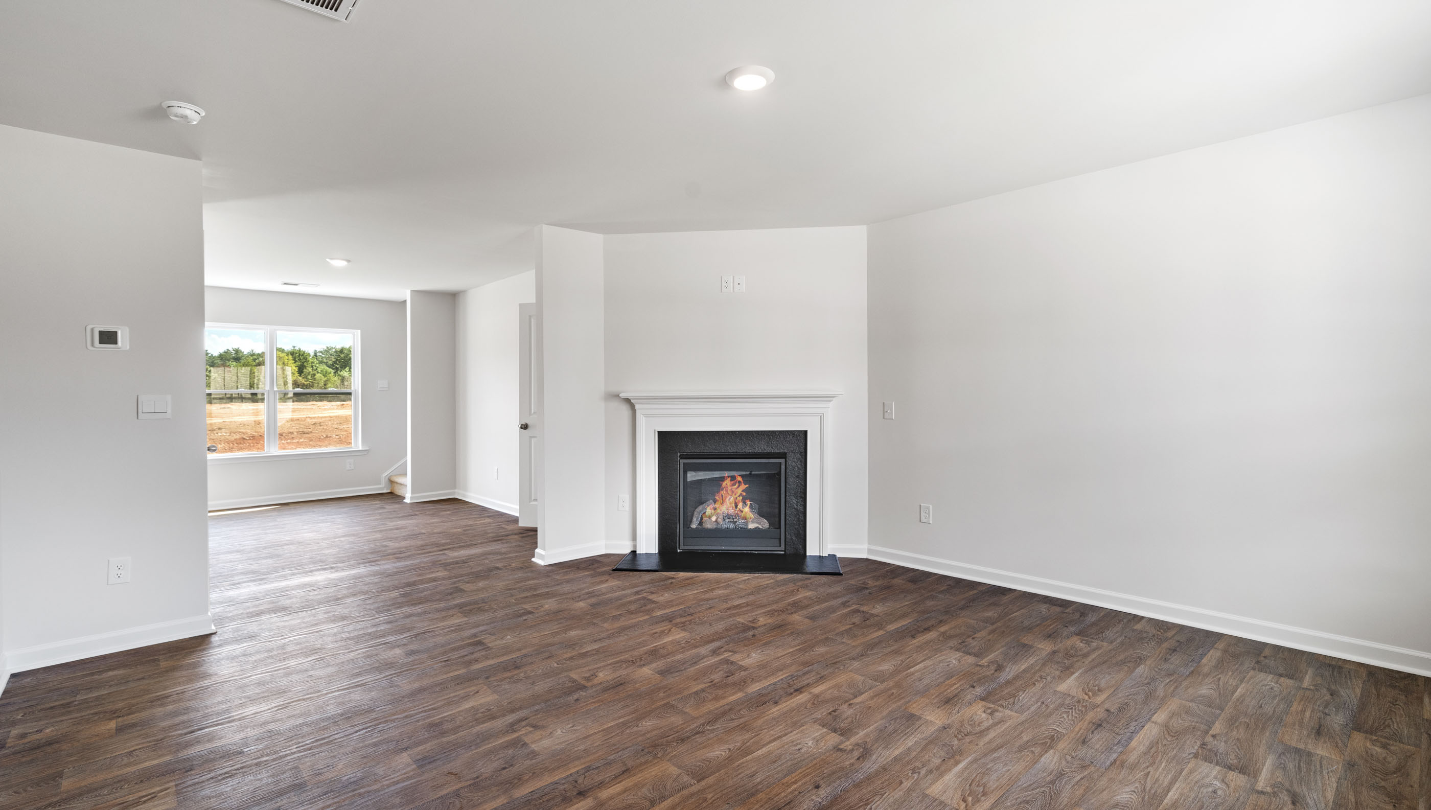 View of family room with fire place.