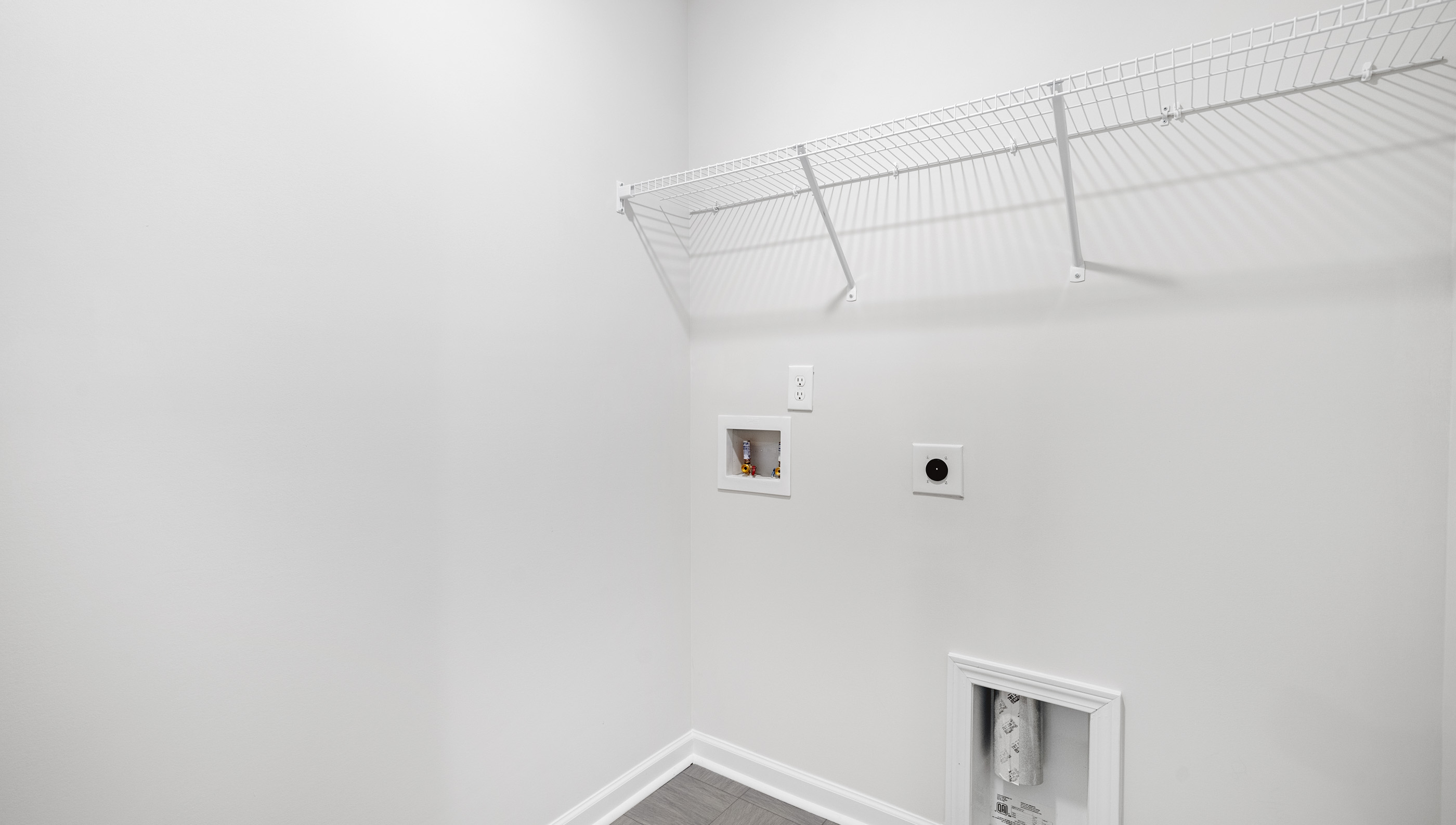 Walk in laundry room.