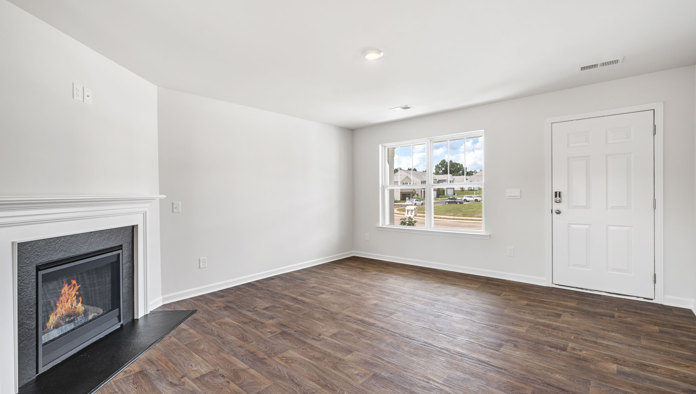 View of family room with fire place.