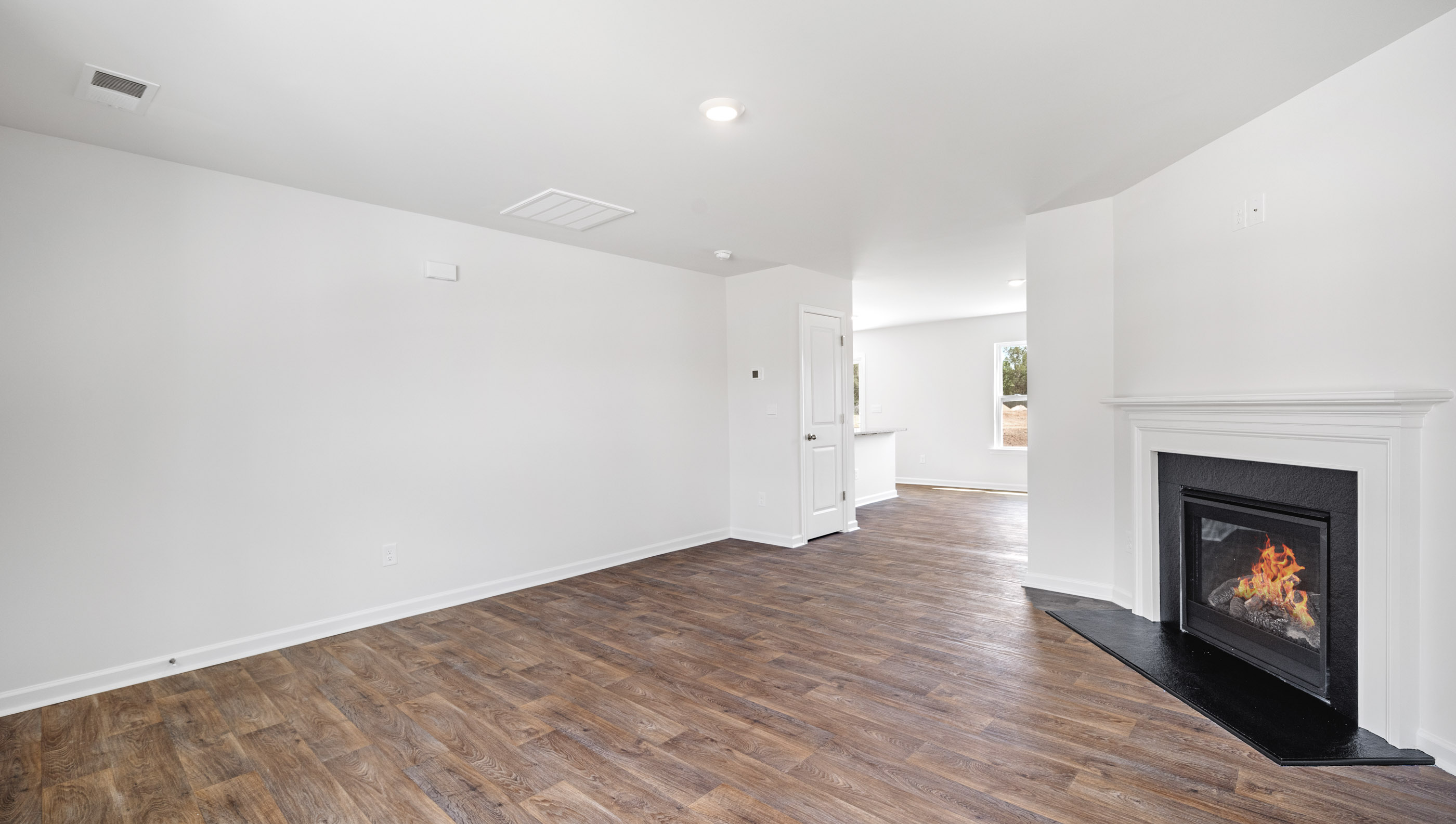 View of family room with fire place.