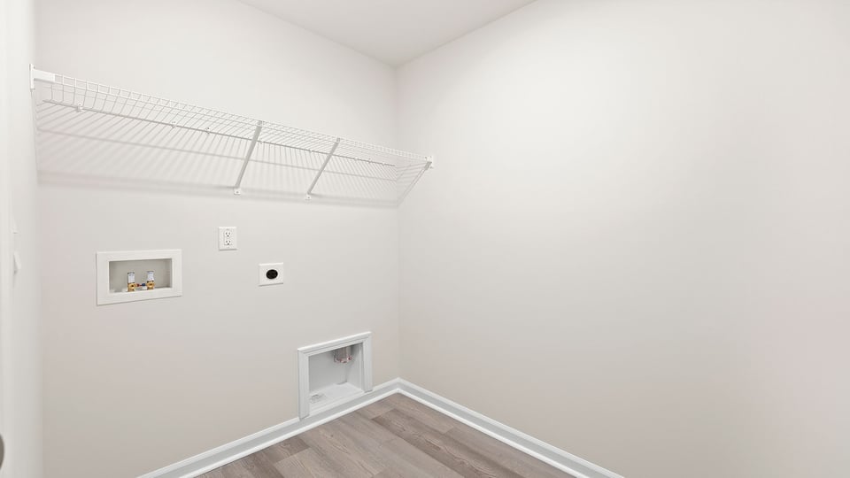 Walk-in laundry room.