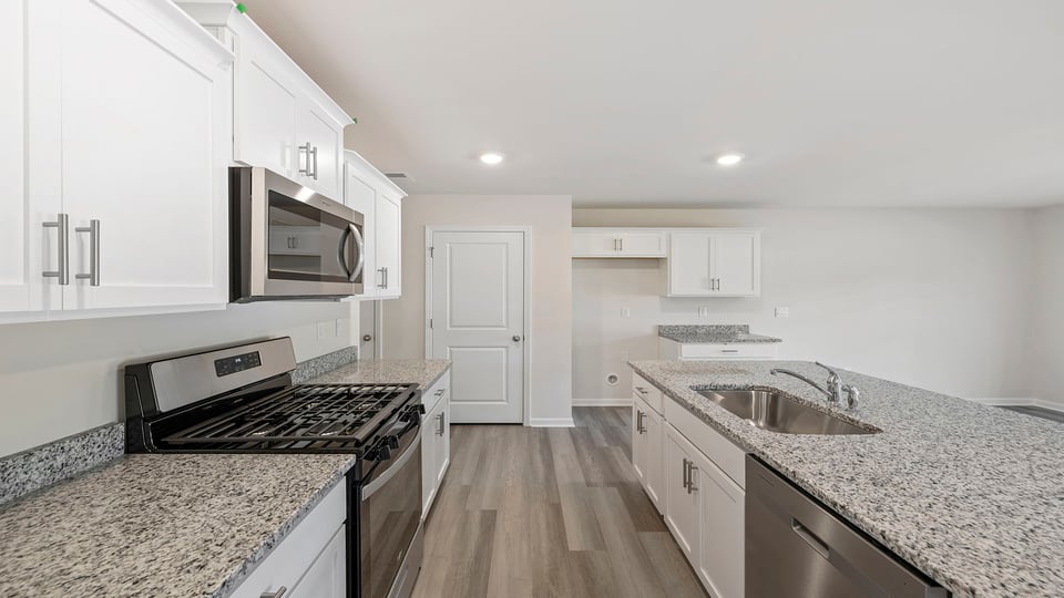 Kitchen island with granite countertops.