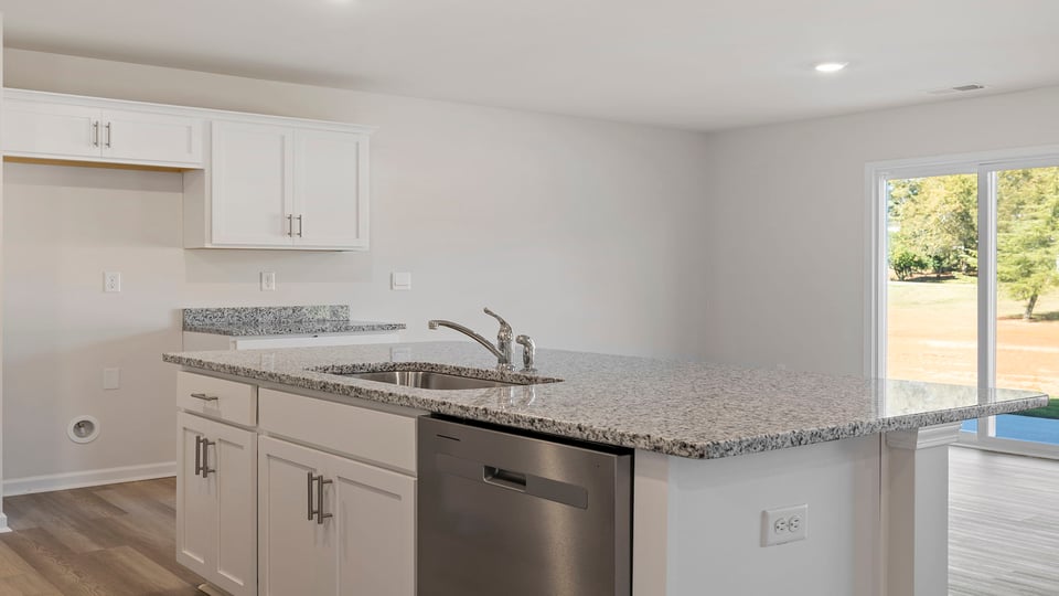 Kitchen island with granite countertops.