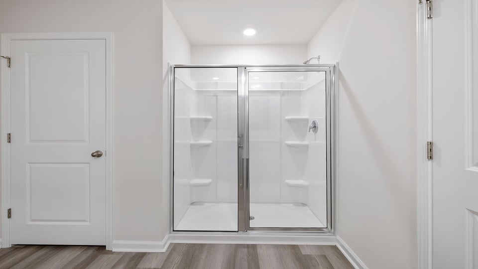 Primary bathroom walk-in shower.