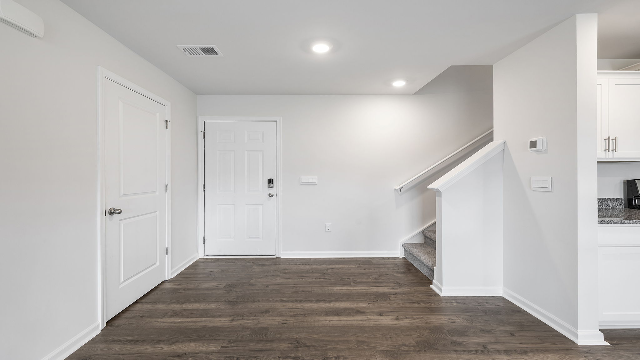 View of the entrance and placement of the stairwell.