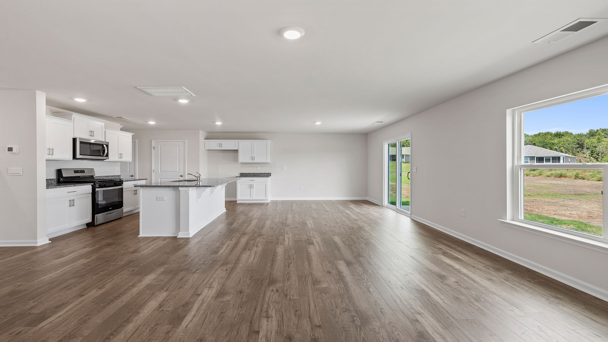 Open floor plan with lots of windows.