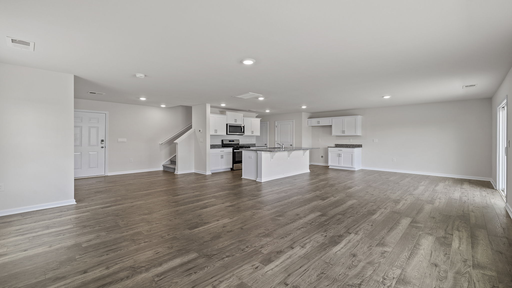 Open floor plan with lots of windows.