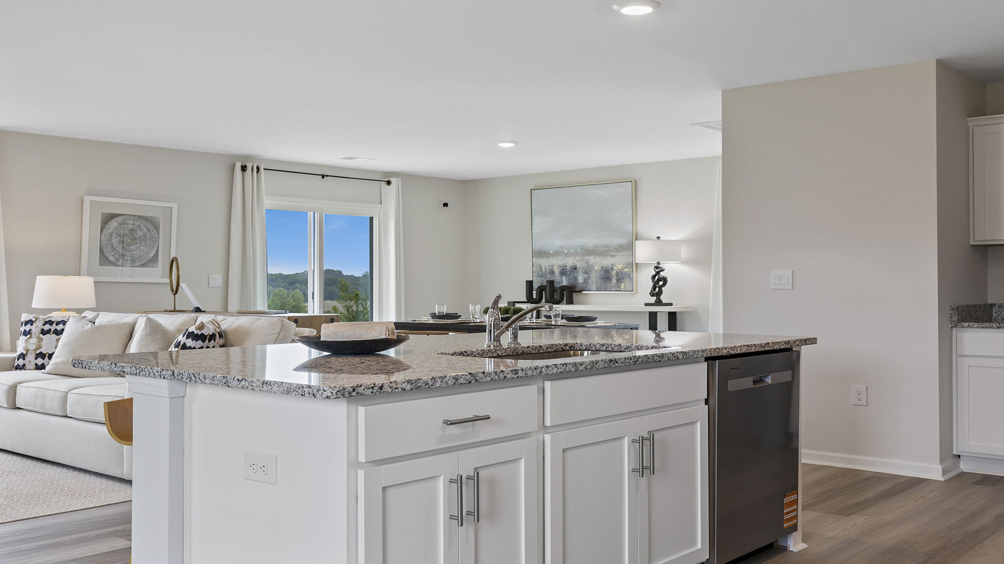 Kitchen with cabinets and island.