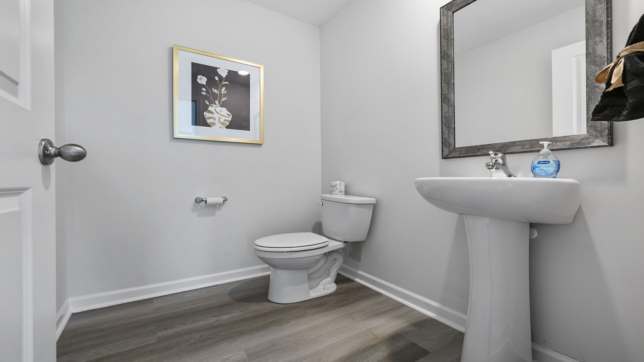 Half bathroom with sink.