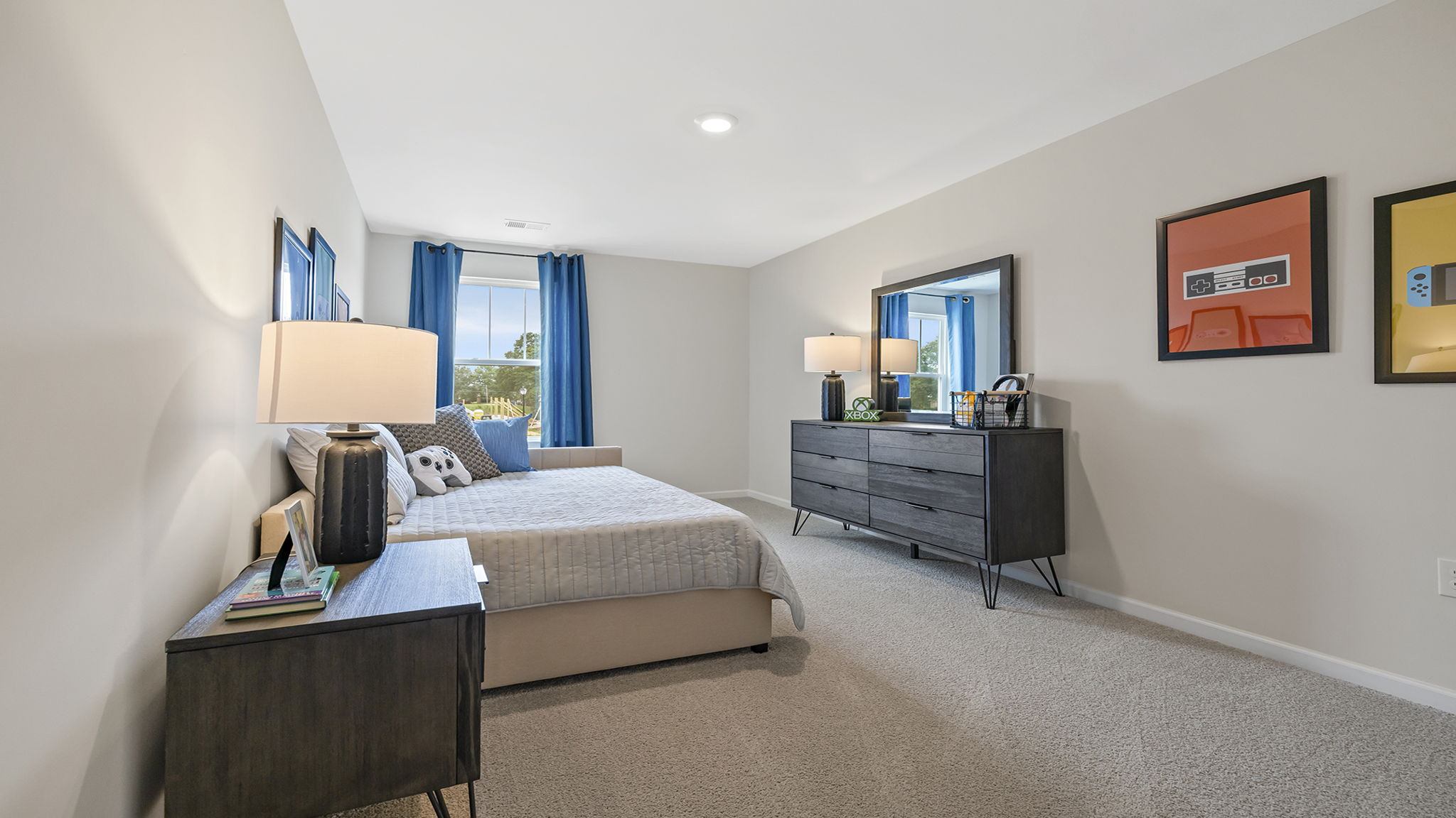 Bedroom with carpet and window.